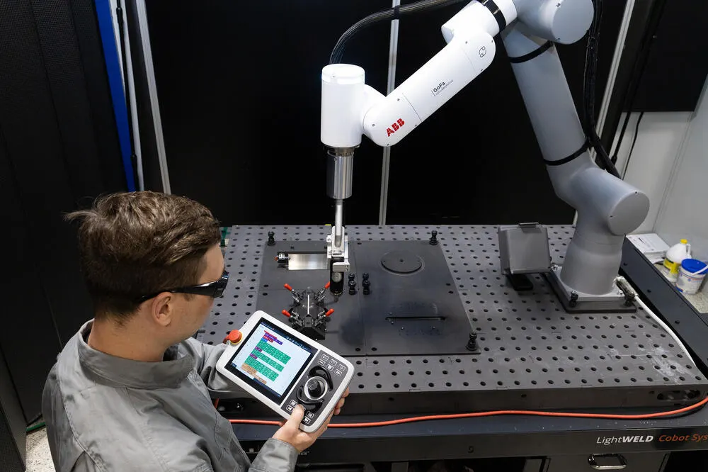LightWELD Cobot System safety features and enclosure