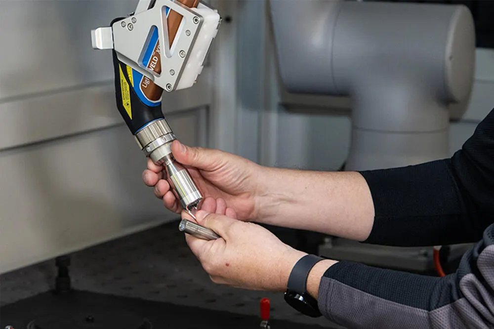 LightWELD Cobot System switching between welding and cleaning